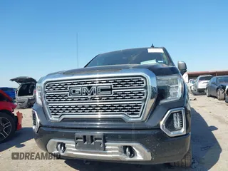 2020 GMC Sierra 1500 Denali with VIN 1GTU9FEL0LZ369793, listed as a IAAI auction lot 41870341 with 81,959 mi miles and . Bid and sale history available at DreamBid. Image 6.