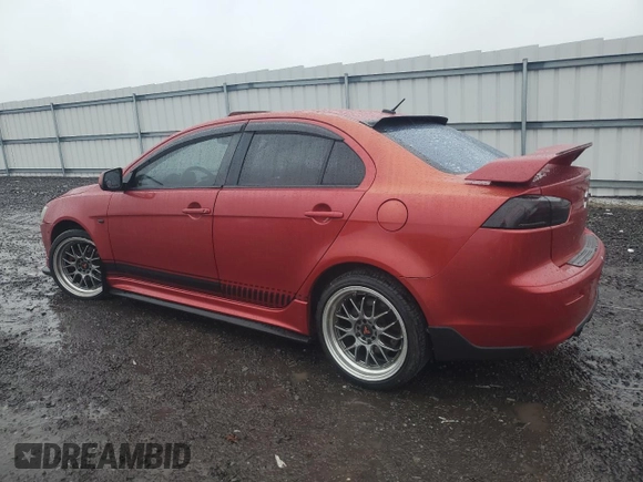 2009 Mitsubishi Lancer GTS with VIN JA3AU86W99U002899, listed as a Copart auction lot 52886455 with 174,184 mi miles and Salvage Title. Bid and sale history available at carsss.com. Image 2.