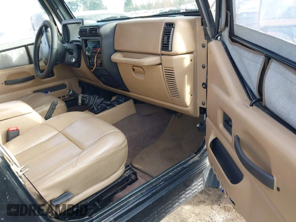 1999 Jeep Wrangler Sahara with VIN 1J4FY49S9XP410760, listed as a IAAI auction lot 41647187 with 181,353 mi miles. Bid and sale history available at carsss.com. Image 5.