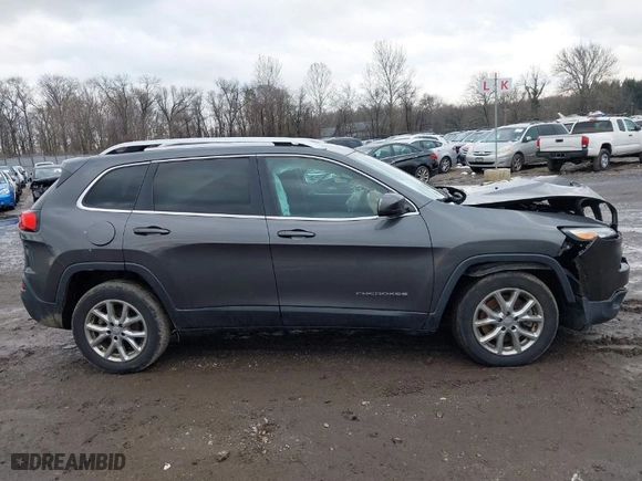 2017 Jeep Cherokee Latitude with VIN 1C4PJLCB4HW507776, listed as a IAAI auction lot 41585656 with 147,959 mi miles. Bid and sale history available at carsss.com. Image 13.