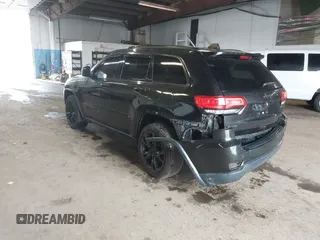 2015 Jeep Grand Cherokee Limited with VIN 1C4RJFBG4FC611156, listed as a IAAI auction lot 42021705 with 137,887 mi miles. Bid and sale history available at carsss.com. Image 3.