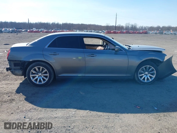 2012 Chrysler 300 with VIN 2C3CCAAG1CH138303, listed as a IAAI auction lot 41773979 with 252,550 mi miles and . Bid and sale history available at DreamBid. Image 13.
