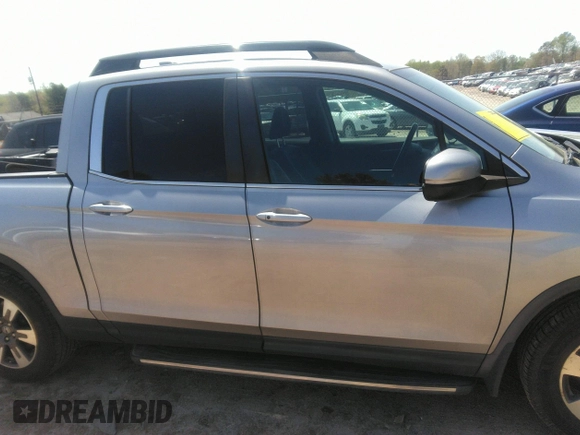 2017 Honda Ridgeline RTL with VIN 5FPYK2F58HB005608, listed as a IAAI auction lot 41934772 with 78,165 mi miles and . Bid and sale history available at DreamBid. Image 13.