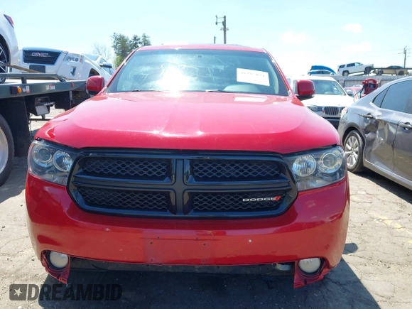 2013 Dodge Durango R/T with VIN 1C4SDJCT0DC686103, listed as a IAAI auction lot 41985034 with 117,212 mi miles and . Bid and sale history available at DreamBid. Image 12.