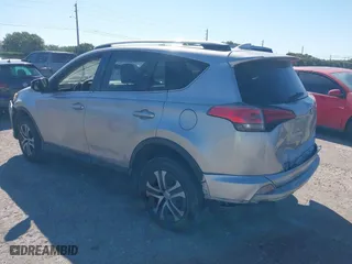 2018 Toyota RAV4 LE with VIN JTMZFREVXJJ196183, listed as a IAAI auction lot 41776107 with 82,713 mi miles. Bid and sale history available at carsss.com. Image 3.