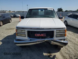 1999 GMC Sierra 1500 z VIN 1GTGC24RXXR721667, wystawiony jako Copart lot #58575985 z przebiegiem 201 752 mil mil oraz Czysty tytuł • Clean title. Historia ofert i sprzedaży dostępna na DreamBid. Obrazek 5.