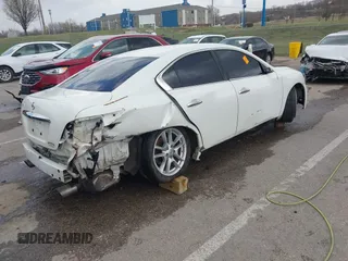 2014 Nissan Maxima S with VIN 1N4AA5AP4EC455147, listed as a IAAI auction lot 41816044 with 180,674 mi miles and . Bid and sale history available at DreamBid. Image 4.