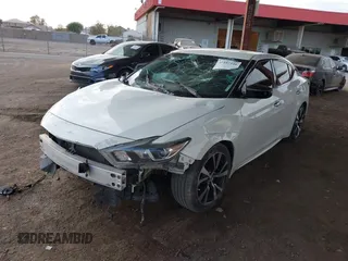 2018 Nissan Maxima SR with VIN 1N4AA6AP1JC397613, listed as a IAAI auction lot 41557340 with 84,749 mi miles. Bid and sale history available at carsss.com. Image 16.