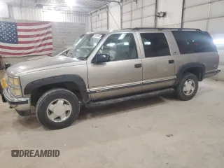 1999 Chevrolet Suburban z VIN 3GNFK16R4XG250550, wystawiony jako Copart lot #51941515 z przebiegiem 202 667 mil mil oraz Szkoda całkowita • Salvage title. Historia ofert i sprzedaży dostępna na DreamBid. Obrazek 1.