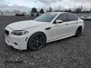 2015 BMW M5 with VIN WBSFV9C58FD594984, listed as a Copart auction lot 46271545 with 71,483 mi miles and Salvage Title. Bid and sale history available at carsss.com. Image 1.