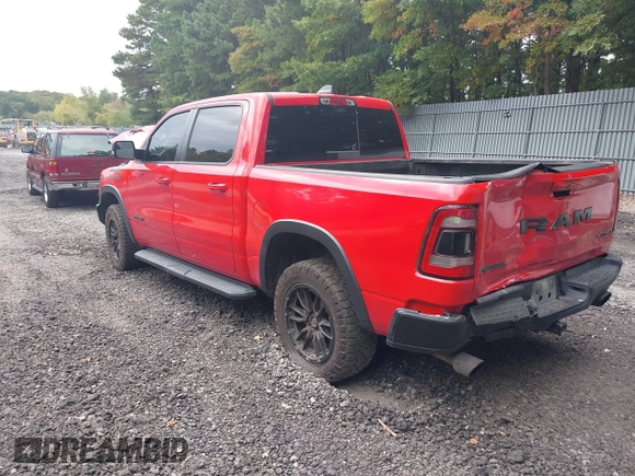 2021 Ram 1500 Rebel with VIN 1C6SRFLT2MN591844, listed as a IAAI auction lot 40410248 with 84,759 mi miles and . Bid and sale history available at DreamBid. Image 3.
