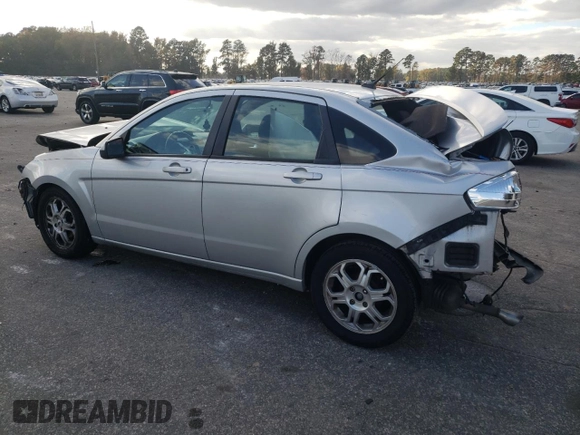 2009 Ford Focus SES with VIN 1FAHP36N29W166278, listed as a Copart auction lot 79237914 with 163,997 mi miles and Salvage Title. Bid and sale history available at carsss.com. Image 2.