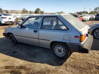 1986 Toyota Tercel z VIN JT2AL31G5G0429131, wystawiony jako Copart lot #79204554 z przebiegiem 124 477 mil mil oraz Szkoda całkowita • Salvage title. Historia ofert i sprzedaży dostępna na DreamBid. Obrazek 2.