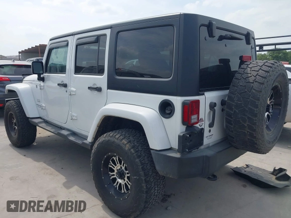 2018 Jeep Wrangler Unlimited Sahara with VIN 1C4HJWEG1JL801934, listed as a IAAI auction lot 42072968 with 112,432 mi miles and . Bid and sale history available at DreamBid. Image 3.