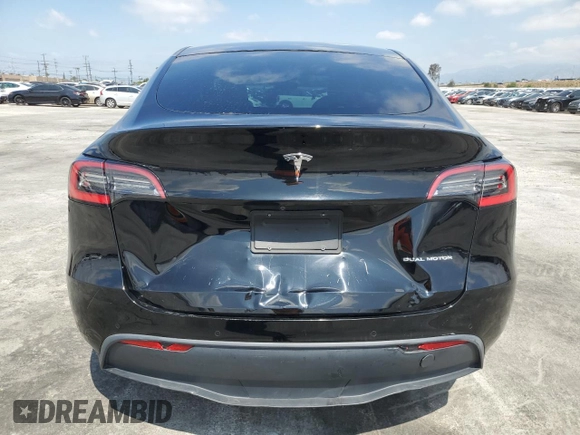 2020 Tesla Model Y Long Range with VIN 5YJYGDEE6LF051549, listed as a Copart auction lot 55063805 with 77,861 mi miles and Salvage Title. Bid and sale history available at DreamBid. Image 6.