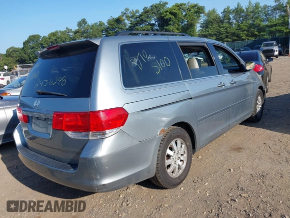 2008 Honda Odyssey EX-L with VIN 5FNRL38718B053448, listed as a IAAI auction lot 40182359 with 164,902 mi miles and . Bid and sale history available at DreamBid. Image 4.
