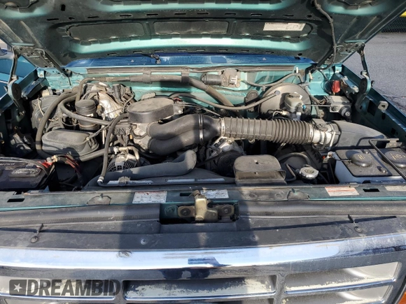 1996 Ford Bronco Custom with VIN 1FMEU15H4TLB59116, listed as a Copart auction lot 52989015 with 210,464 mi miles and Salvage title. Bid and sale history available at DreamBid. Image 12.