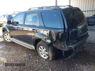 2011 Mazda Tribute Sport with VIN 4F2CY9C7XBKM06202, listed as a IAAI auction lot 41281197 with 195,443 mi miles and . Bid and sale history available at DreamBid. Image 3.