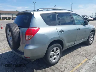2008 Toyota RAV4 with VIN JTMZD33V085104930, listed as a IAAI auction lot 42068409 with 187,574 mi miles. Bid and sale history available at carsss.com. Image 4.