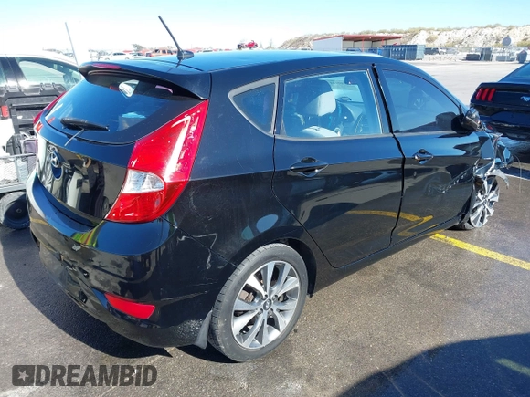 2015 Hyundai Accent Sport with VIN KMHCU5AE8FU233131, listed as a IAAI auction lot 41360461 with 99,480 mi miles. Bid and sale history available at carsss.com. Image 4.