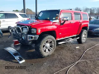 2009 Hummer H3 SUV Alpha with VIN 5GTEN13L398145561, listed as a IAAI auction lot 41232458 with 153,543 mi miles. Bid and sale history available at carsss.com. Image 18.