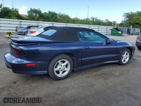 1999 Pontiac Firebird Trans Am with VIN 2G2FV32GXX2229175, listed as a Copart auction lot 65678225 with 180,298 mi miles and Salvage title. Bid and sale history available at DreamBid. Image 3.