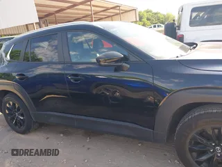 2025 Mazda CX-50 S Preferred z VIN 7MMVABBMXSN337974, wystawiony jako IAAI lot #42238129 z przebiegiem 6 159 mil mil oraz . Historia ofert i sprzedaży dostępna na DreamBid. Obrazek 13.