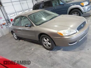 2006 Ford Taurus SE with VIN 1FAFP53U46A123827, listed as a IAAI auction lot 42042946 with 146,393 mi miles. Bid and sale history available at carsss.com. Image 1.
