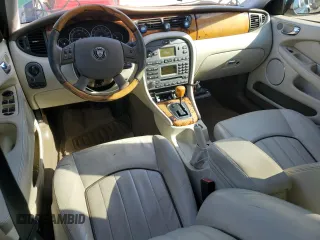 2007 Jaguar X-Type z VIN SAJWA51A87WJ07995, wystawiony jako Copart lot #42737205 z przebiegiem 82 863 mil mil oraz Tytuł czysty. Historia ofert i sprzedaży dostępna na DreamBid. Obrazek 8.