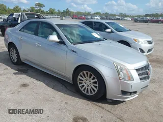 2010 Cadillac CTS z VIN 1G6DA5EG9A0128758, wystawiony jako IAAI lot #41958677 z przebiegiem 156 088 mil mil oraz . Historia ofert i sprzedaży dostępna na DreamBid. Obrazek 1.