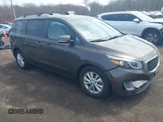 2016 Kia Sedona LX with VIN KNDMB5C11G6158934, listed as a IAAI auction lot 41908323 with 105,888 mi miles and . Bid and sale history available at carsss.com. Image 1.