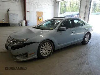 2010 Ford Fusion Hybrid с VIN 3FADP0L39AR140400, выставлен на аукционе Copart как лот 56682385 с пробегом 164 628 миль миль и Списание • Salvage title. История ставок и продаж доступна на DreamBid. Изображение 1.
