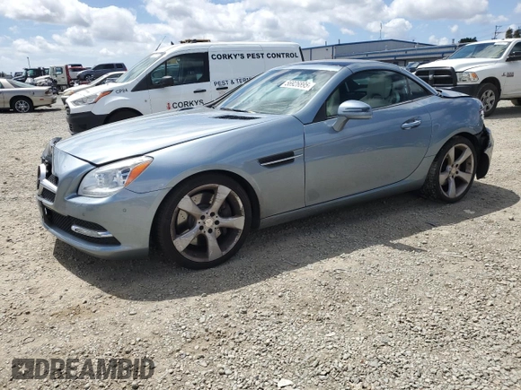 2012 Mercedes-Benz SLK 350 with VIN WDDPK5HA9CF017809, listed as a Copart auction lot 56926895 with 106,692 mi miles and Clean title. Bid and sale history available at DreamBid. Image 1.