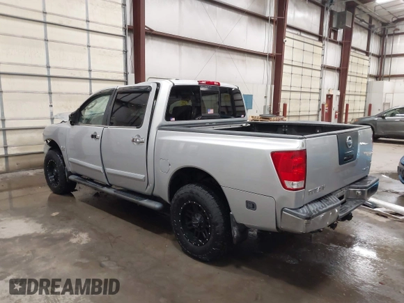 2004 Nissan Titan LE with VIN 1N6AA07B44N512889, listed as a IAAI auction lot 41569019 with 154,655 mi miles. Bid and sale history available at carsss.com. Image 3.