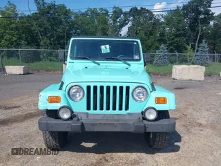 2002 Jeep Wrangler Sahara с VIN 1J4FA59S62P768112, выставлен на аукционе IAAI как лот 42657738 с пробегом 196 571 миль миль и . История ставок и продаж доступна на DreamBid. Изображение 6.