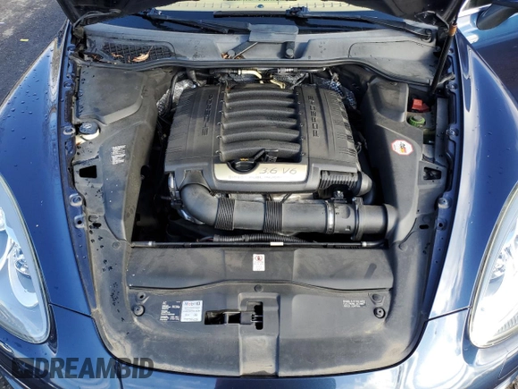 2012 Porsche Cayenne with VIN WP1AA2A20CLA02006, listed as a Copart auction lot 49129885 with 143,605 mi miles and Salvage title. Bid and sale history available at DreamBid. Image 12.