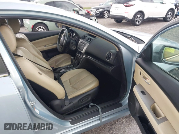 2009 Mazda 6 i Touring with VIN 1YVHP82AX95M19535, listed as a IAAI auction lot 41987285 with 129,111 mi miles and . Bid and sale history available at carsss.com. Image 5.