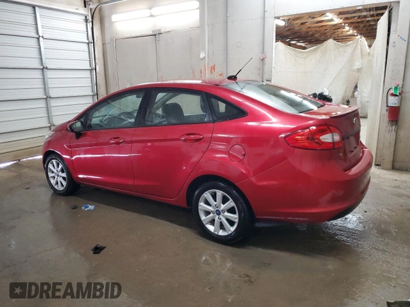 2012 Ford Fiesta SE with VIN 3FADP4BJ1CM147493, listed as a Copart auction lot 51436635 with 166,121 mi miles and Salvage Title. Bid and sale history available at DreamBid. Image 2.