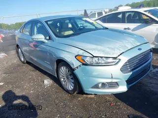 2013 Ford Fusion SE Hybrid with VIN 3FA6P0LUXDR271325, listed as a IAAI auction lot 42006035 with 193,276 mi miles and . Bid and sale history available at carsss.com. Image 1.