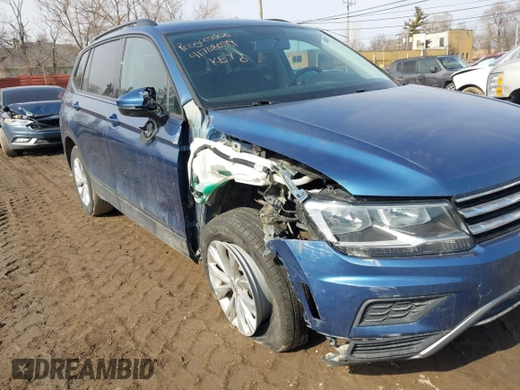 2018 Volkswagen Tiguan S with VIN 3VV1B7AX6JM108786, listed as a IAAI auction lot 41708099 with 162,289 mi miles and . Bid and sale history available at DreamBid. Image 6.