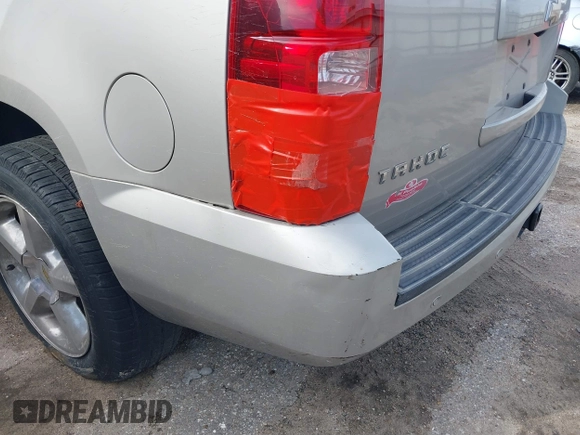 2008 Chevrolet Tahoe LTZ with VIN 1GNFC13JX8R277832, listed as a IAAI auction lot 41348121 with 210,576 mi miles and . Bid and sale history available at DreamBid. Image 12.