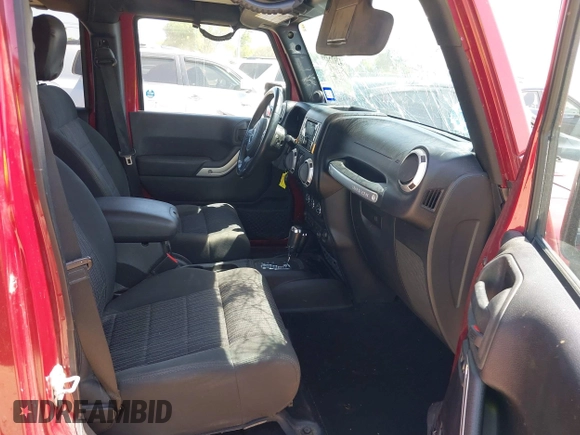 2012 Jeep Wrangler Unlimited Sahara with VIN 1C4BJWEG2CL209600, listed as a IAAI auction lot 42015290 with 133,229 mi miles and . Bid and sale history available at DreamBid. Image 5.