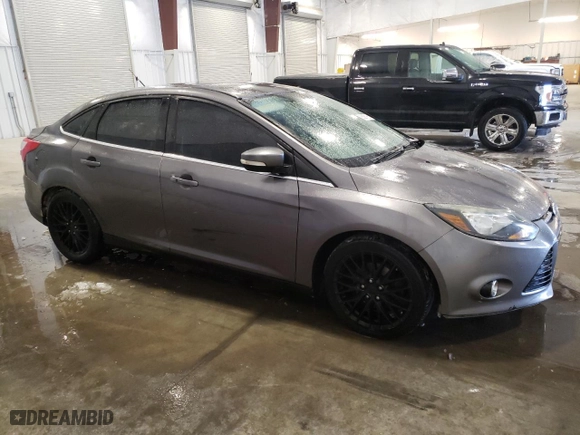 2014 Ford Focus Titanium with VIN 1FADP3J2XEL441483, listed as a Copart auction lot 88397195 with 54,813 mi miles and Salvage Title. Bid and sale history available at carsss.com. Image 4.