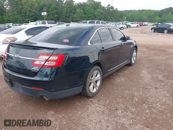 2014 Ford Taurus SEL with VIN 1FAHP2E83EG125068, listed as a IAAI auction lot 42101295 with 244,063 mi miles. Bid and sale history available at carsss.com. Image 4.