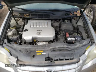 2005 Toyota Avalon XL z VIN 4T1BK36B95U044040, wystawiony jako Copart lot #59369691 z przebiegiem 111 373 mil mil oraz Szkoda całkowita • Salvage title. Historia ofert i sprzedaży dostępna na DreamBid. Obrazek 7.