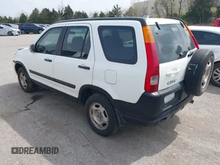 2004 Honda CR-V LX with VIN JHLRD68454C004803, listed as a IAAI auction lot 41910388 with 192,766 mi miles and . Bid and sale history available at carsss.com. Image 3.