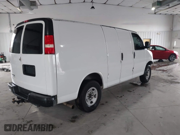 2014 Chevrolet Express Cargo Van with VIN 1GCWGFCA0E1138684, listed as a IAAI auction lot 41796495 with 101,756 mi miles. Bid and sale history available at carsss.com. Image 4.