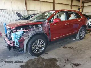 2023 Cadillac XT5 AWD Premium Luxury with VIN 1GYKNDRS1PZ116085, listed as a Copart auction lot 65130735 with 21,051 mi miles and Salvage title. Bid and sale history available at DreamBid. Image 1.
