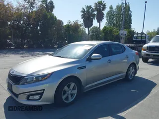 2014 Kia Optima LX with VIN KNAGM4A70E5482966, listed as a IAAI auction lot 42109539 with 194,519 mi miles and . Bid and sale history available at carsss.com. Image 6.