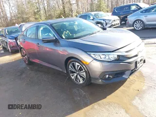 2017 Honda Civic Sedan EX-L with VIN 2HGFC1F70HH633263, listed as a IAAI auction lot 41511642 with 65,769 mi miles. Bid and sale history available at carsss.com. Image 1.